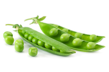 Young grean peas on white