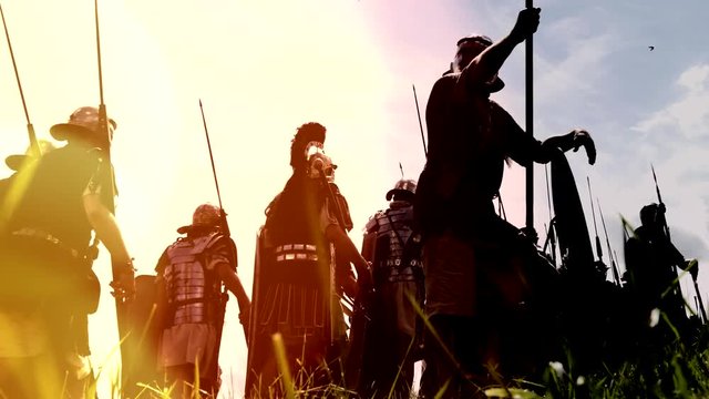 troop of historical gladiators marching together. 
