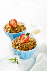 Homemade granola with fresh strawberry