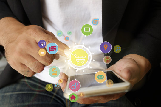 shopping cart with application software icons on mobile , busine