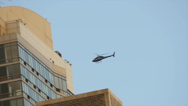 helicopter flying by. chopper aircraft in flight. police observation background