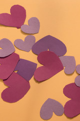 This is a photograph of heart shaped construction paper organized in a pattern