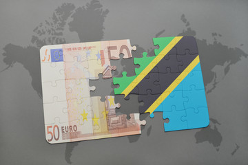 puzzle with the national flag of tanzania and euro banknote on a world map background.