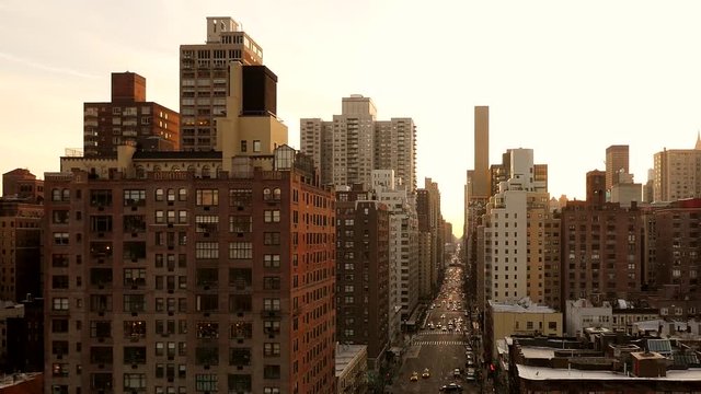 new york city aerial view of street and skyline at sunset. epic landmark scenery