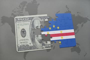 puzzle with the national flag of cape verde and dollar banknote on a world map background.