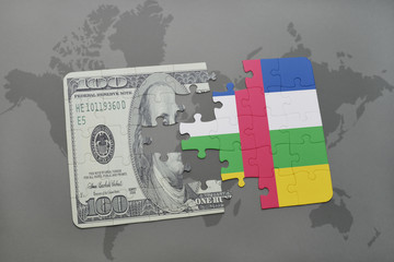 puzzle with the national flag of central african republic and dollar banknote on a world map background.