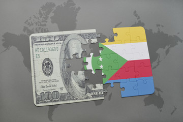 puzzle with the national flag of comoros and dollar banknote on a world map background.