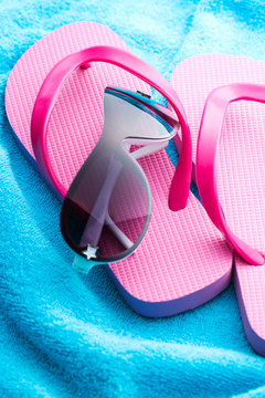 Flip flops and sunglasses.