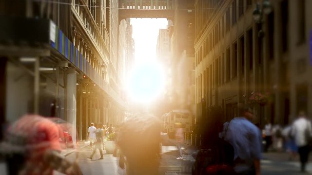 people walking on crowded street in the city. pedestrians commuters background