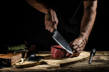 Chef butcher prepare beef steak