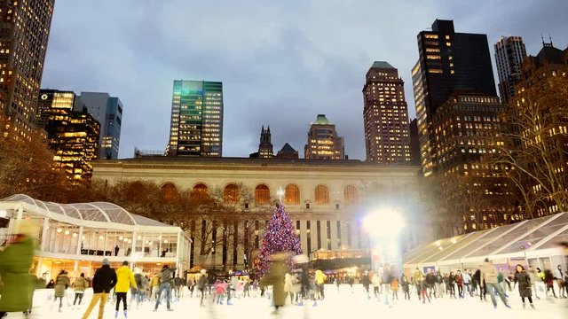 Ice Skating Rink At Bryant Park In New York City. People Enjoying Holidays