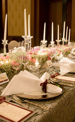 Dining table setting in warm tone.