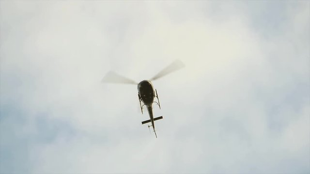 helicopter flying by. chopper aircraft in flight. police observation background