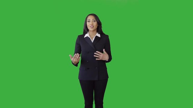 portrait of young asian women standing isolated against green screen background