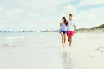 Romantic young couple on the beach