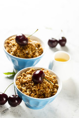 Homemade granola with honey and cherries
