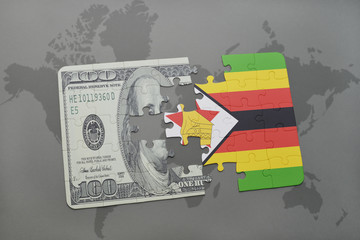 puzzle with the national flag of zimbabwe and dollar banknote on a world map background.