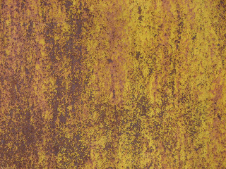 Cracked paint on an old rusty fence
