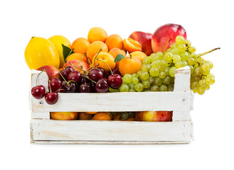 Various fruits in wooden box