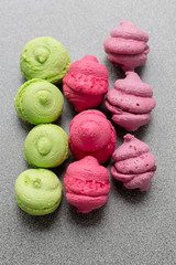 Bright purple, pink and pistachio cakes closeup