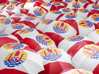 Obraz premium Umbrellas with flag of french polynesia