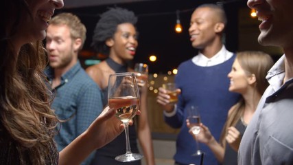 Couples Chatting And Drinking At Evening Party, Slow Motion