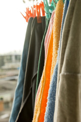 clothes hanging to dry on a laundry line and sun shining © worawut17