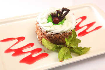 dessert plate with mint leaf