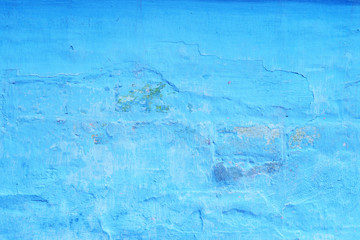 Wall fragment with scratches and cracks