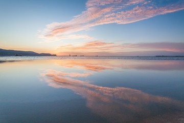 Reflection Sunrise or Sunset View With Orange Cloud and Blue Sky