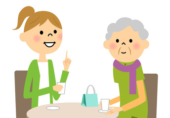 若者とティータイムを楽しむシニア