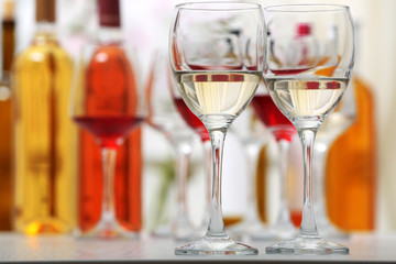 Wine glasses with red and white wine, closeup