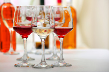 Wine glasses with red and white wine, closeup