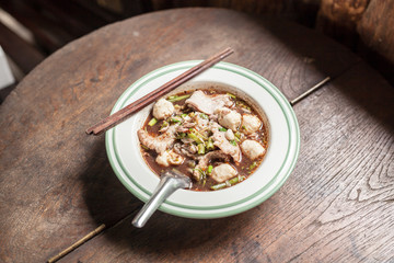 bowl of noodles  on wooden table