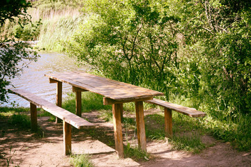 Bench and table in a tranquil landscape