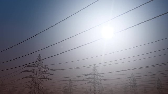 Power line against clear sky, dolly shot. 4K seamless loop able clip