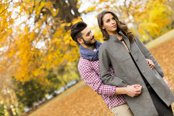 Young couple in the autumn park