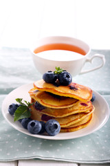 Blueberry pancakes in a stack