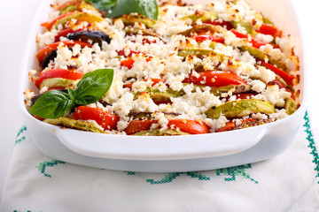 Zucchini, tomato and feta cheese bake