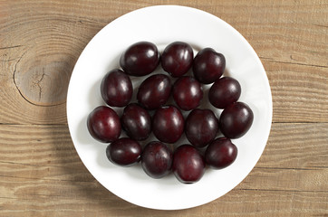 Plums in plate
