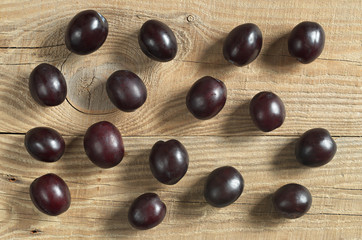 Plums on table