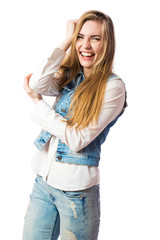 Young sexy sensual fashion woman on white wall background, dressed in jeans style, stylish, fashionable blonde posing in the studio.