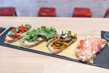 food, bruschetta, tomato, snack, bread, appetizer, meal, italian, toasted