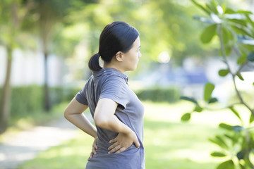 Woman with Pain in Her Lower Back