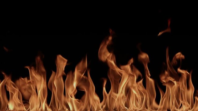 UHD video - High resolution blazing flames on a black background