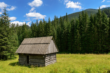 Small village cottage in the mountain valley. 