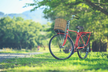 Red Japan style classic bicycle at the park