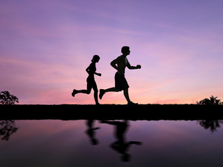 Fototapeta na wymiar silhouette man and woman running