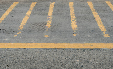 Asphalt road with yellow sign line