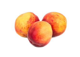 Fototapeta premium Three fresh peaches